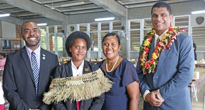 From left: Mosese Bulitavu (father), Adi Cakobau School head girl Salote Bulitavu, Rasala Malani Bulitavu (mother) and Minister for Education Aseri Radrodro during the ACS investiture on March 10, 2023. Photo: Jone Salusalu