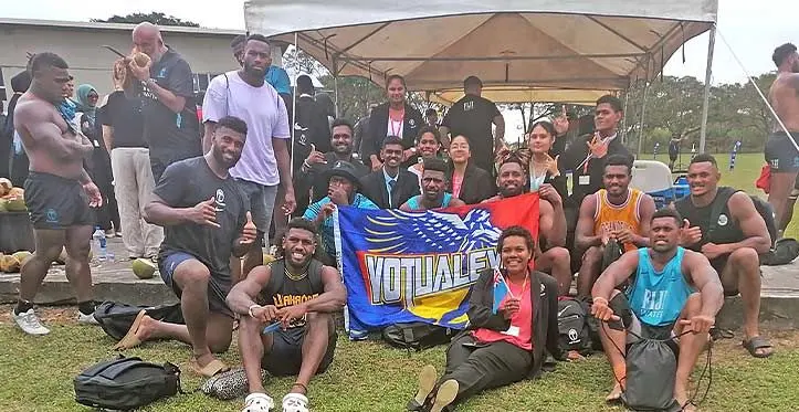 Officials and members of the FIJI Water Flying Fijians squad with Votualevu College students in Nadi on July 25, 2023. Photo: Mereleki Nai