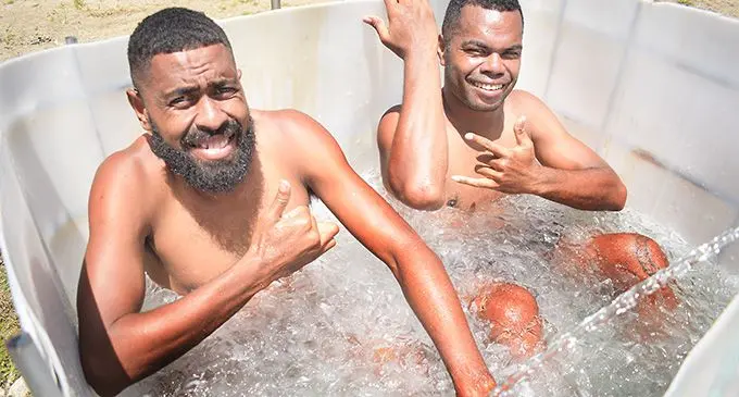 Suva football striker Samuela Drudru (left), and defender Waisake Navunigasau during their ice bath at the Fiji Football Association Academy in Vatuwaqa, Suva, on October 4, 2022. Photo: Ronald Kumar 