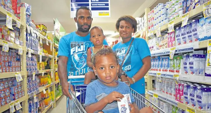 Bonefasio Rokomasi with his wife Lite Kamikamica and their children Bonefasio Rokomasi Junior (front) and Setafano Mocevakaca at Shop N Save March 9, 2018. Photo: WATI TALEBULA