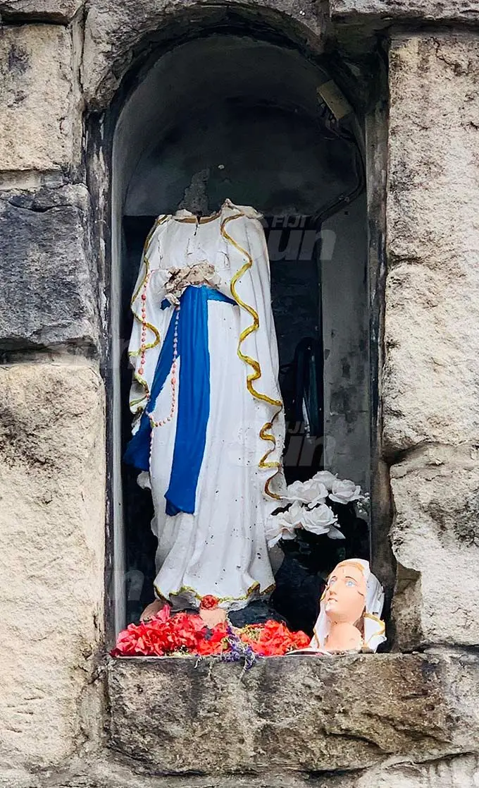 The damaged statue of Mother Mary at the Sacred Heart Cathedral in Suva on November 11, 2020. Photo: Fernando Lobendahn
