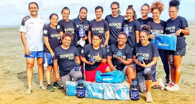 Women's Open team with Head Coach Tomasi Tiko. PHOTO: Touch Federation FIji