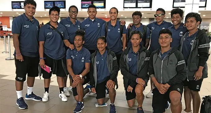 Fiji Airways Fijiana 7s team: (Standing left-right) Rusila Nagasau (captain), Lavenia Tinai, Raijieli Daveua, Vasiti Solikoviti, Sereana Nagatalevu, Merewalesi Rokouono, Luisa Tisolo, Ana Naimasi, Ana Roqica. Front ( left-right) Akanisi Sokoiwasa, Tokasa Senibuli, Paulini Koroiwaqa, Asinate Savu at Nadi International Airport on April 9, 2019. Photo: Waisea Nasokia
