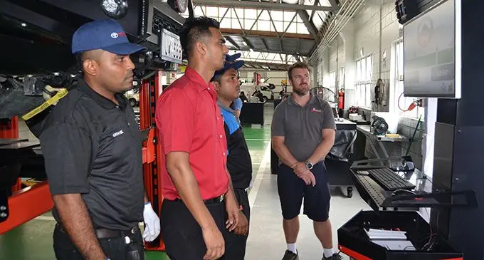 Autohoist Australia director Todd Webster demonstrates the features of the Bright 3D Wheel Alignment machines to the staff of Asco Motors on February 7, 2019. Photo: Asco Motors
