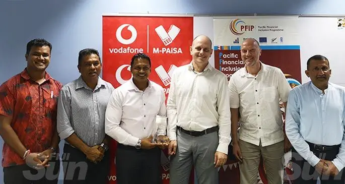 AN AWARD FOR VODAFONE: From left: Pacific Financial Programme (PFIP) financial inclusion specialist Fiji Praneel Pritesh, Vodafone Fiji head of e-commerce and corporate affairs Shailendra Prasad, chief marketing officer Rajnesh Prasad, UNCDF global digital lead Francios Coupienne, PFIP programme manager Bram Peters, deputy programme manager Krishnan Narasimhan after the presentation of the Reuben J Summerline (RJS) Innovation award for 2019 to Vodafone Fiji on February 10, 2020. Photo: Laiseana Nasiga.