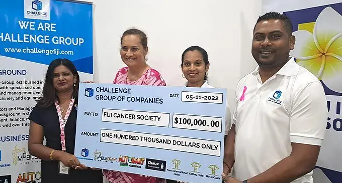 Fiji Cancer Society Western Division treasurer Pritika Mala and CEO Belinda Chan receive the cheque from Challenge Group administrative manager, Nileshni Chand and financial controller, Rimal Mogam in Lautoka on November 5, 2022. Photo: Waisea Nasokia