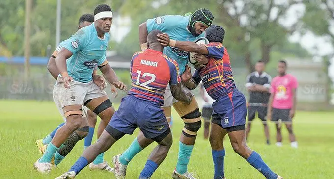 Suva rugby lock Sorovakatini Tuifagalele (with ball) is tackled by the Namosi players during their Skipper Cup clash on April 6, 2024. Tuifagalele played for the Fijian Drua during the 2022 Super Rugby Pacific. Photo: Ronald Kumar