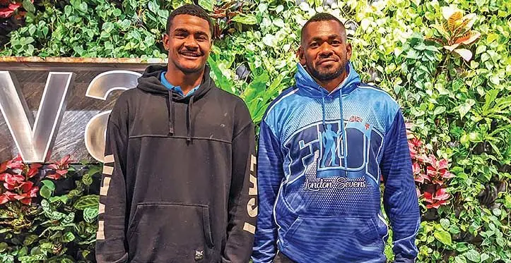 France bound.... Setareki Turagacoke (left) and Fijian sevens forward Sevuloni Mocenacagi at the Singapore International Airport on September 12, 2023. Photo: Sereana Salalo.
