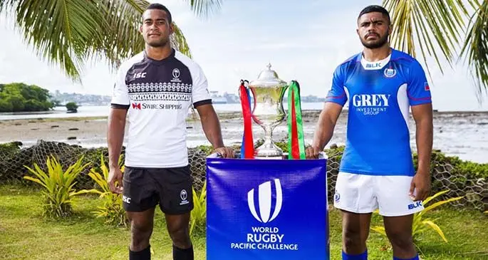 From left: Swire Shipping Fijian Warriors captain Tuidraki Samusamuvodre with Samoa A counterpart, Joseph Faleafaga, and the World Rugby Pacific Challenge Cup at Tikaram Park in Lami on March 5, 2020. Photo: World Rugby/ZoomFiji