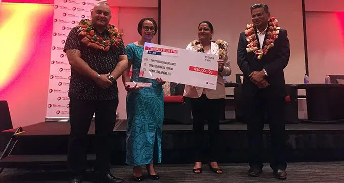 Letila Uluiqalau Takala with guests at the awards presentation.