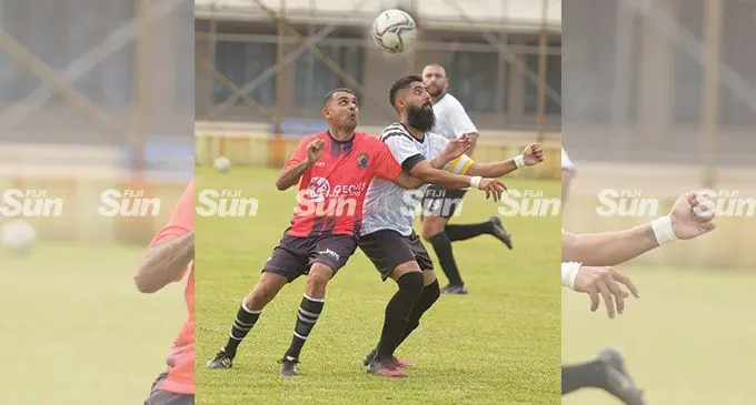 Mowesh Champak of Suva and Rajan Hira of Lami One battle for possession during the Gujrati tournament at Fiji FA ground in Vatuwaqa, Suva, on April 15, 2022.  Photo: Ronald Kumar. 
