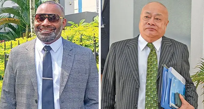 Newly appointed Deputy DPP John Rabuku outside his office in Suva and Attorney-General Graham Leung.