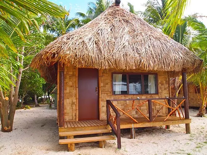 Beachfront villas at Leleuvia Island Resort.