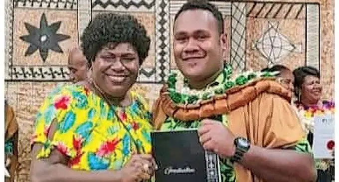 Koresi lagilagi with his sister, Mereoni Nalawakula, during his  graduation last month