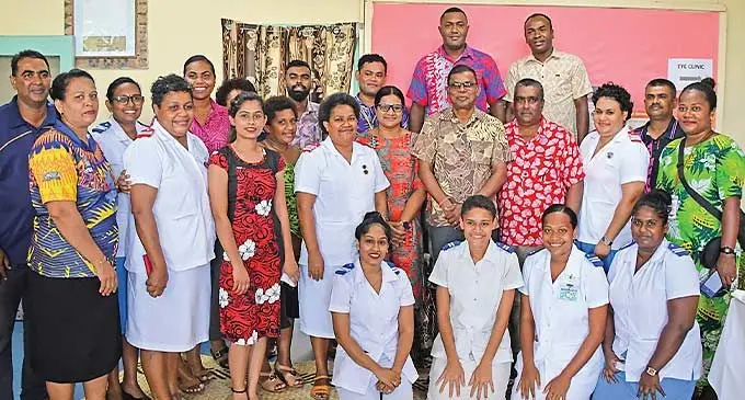 Deputy Prime Minister and Minister for Finance Biman Prasad with health professionals of Tavua Hospital. Photo: DEPTFO News