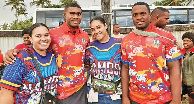 Namosi halfback Aminiasi Natoga (right) with fans at Navua. He is going to play a big role in tomorrow’s Farebrother-Sullivan Trophy defence against Nadi in Suva.