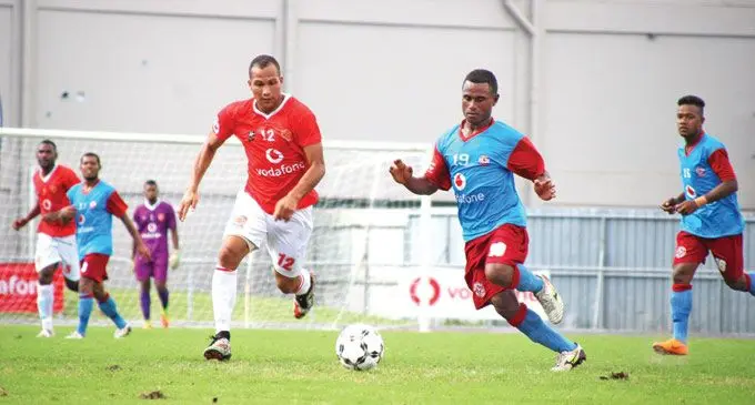 Rewa’s midfielder Tevita Warainaivalu (left) defends against National Hire Nasinu’s Filipe Tuinadave during the Vodafone Fiji FACT clash at Churchill Park, Lautoka on May 3,2019. Rewa won 3-0.  Photo: Rohit Kumar