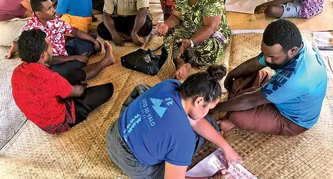 A volunteer from the Uto Ni Yalo Trust with a participant at the Re-Weaving the Ecological Mat (REM) project workshop at Namalata Village in Bua on March 9, 2022. Photo: Sampras Anand