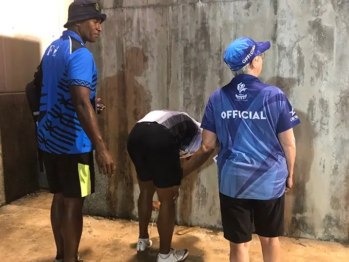 Banuve Tabakaucoro prays after winning the 100m men’s final on July 16, 2019. 