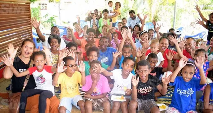 WOWS Kids Fiji co-founder Sina Kami (left), with parents and children at their Rewa Street office in Suva. Photo: File