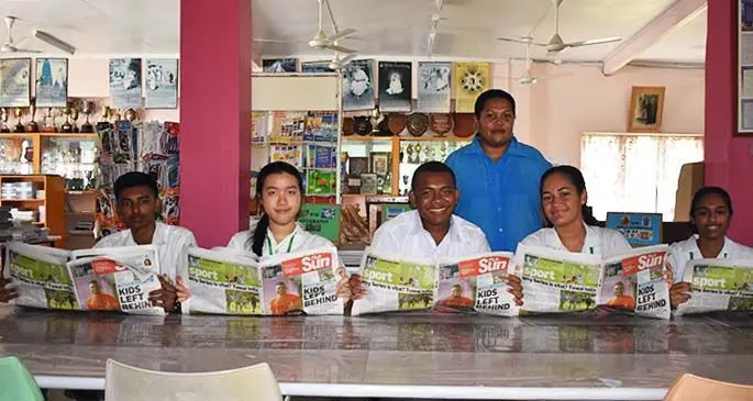 Swami Vivekananda College, Nadi, Year 12 prefects read yesterday’s Fiji Sun newspaper. From left are Sharvesh Kumar, Zu Feng, Viliame Rokoduna, Joan McGowan, Shruti Kumar with their teacher (standing), Maria Rabuka. 