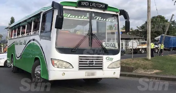 The bus allegedly involved in the accident is parked along the Junction of Kadavu street in Lautoka as police investigate the scene. Photo.Charles Chambers