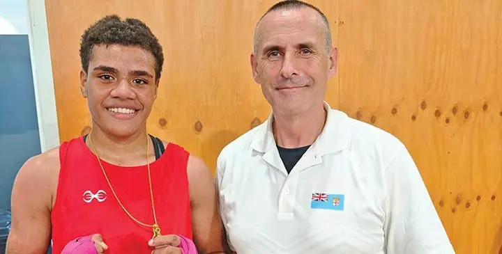 From left; Female boxer Anaseini Naikanivatu with head coach Cameron Todd after winning the gold medal in the women’s youth 70kg of the Queensland Golden Gloves competition in Australia on July 16, 2025. Photo: Boxing Fiji