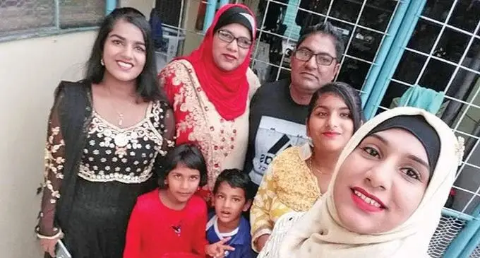 From left: Raeesah Sadiyah Ali (2nd child), Zakirah Sadiyah Ali (4th child- red dress), Farzana Ali (mother), Abdul Muqtadir Habib Ali (5th Child- Blue Shirt), Muktar Ali (Husband- black shirt), Aafreen Saniyah Ali (3rd Child - Yellow Kameez) and Nishaat Sadiyah Ali (1st Child - white kameez).
