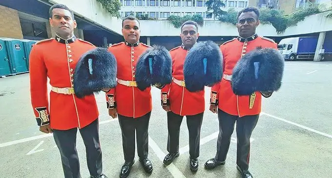 Members of the Irish Guard Regiment of the British Armed Forces after the funeral procession of the late Queen Elizabeth II (from left) Ratu Sitiveni Matanababa, David Mcgoon, Ropate Ralawa and Elia Tuni in London on September 19, 2022