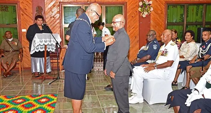 Manohar Lal Vithal receives the 50th Anniversary of Independence Commemorative medals from the President Major-General (Ret’d) Jioji Konrote during a special investiture ceremony held at the Lomaiviti Provincial Council office on October 30, 2020. Photo: Fijian Government
