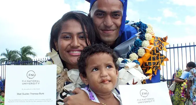 Graduates husband and wife Joseph and Wati Bure with daughter Katie Bure after the FNU graduation at the FMF Gymnasium Suva on May 2,2019.  Photo: Simione Haravanua