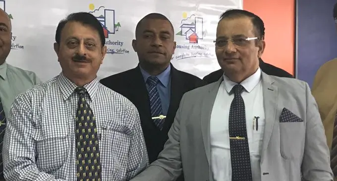 Former Housing Authority CEO Dr Punit Sethi (right) during his welcome last year.  