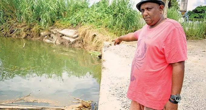 Digger operator Fayum Khan shows where he saw the body of a young indo-fijian man next to Toga Rewa bridge in Nausori on Januray 26, 2022. Photo: Ronald Kumar.
