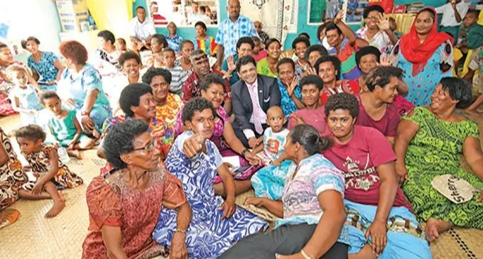 The Attorney-General and Minister for Education with parents and teachers at the Kasavu Primary School Prefect Induction on February 9, 2018.  Photo: DEFTPO