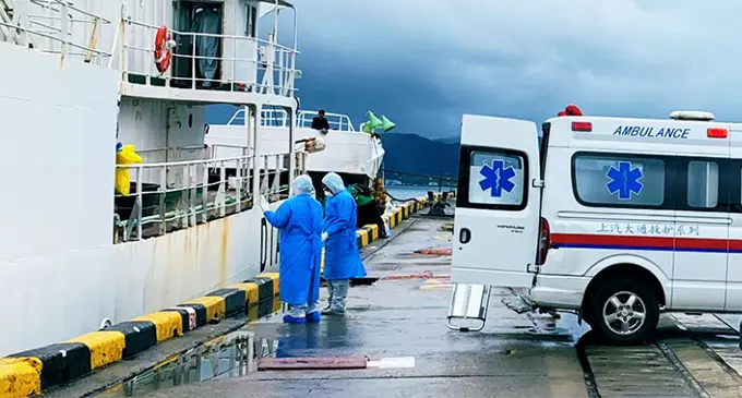 The Ministry of Health and Medical Services team offloads the Korean national from the fishing vessel to the ambulance on its way to the Colonial War Memorial Hospital.  Photo: Fiji Maritime Surveillance Rescue Coordination Centre 