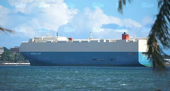 247 cars offloaded....Vehicle carrier Crystal Ace has offloaded 247 cars during its scheduled trip to Suva Port. Sailing under the flag of Marshall Islands, Crystal Ace arrived at Suva Port on November 14 after sailing from Japan. This vessel is one of three vehicle carriers that are scheduled to arrive in Fiji this month. WORDS: Laiseana Nasiga. Vehicle carrier Crystal Ace anchored in Suva Harbour on November 14, 2021. Photo: Leon Lord