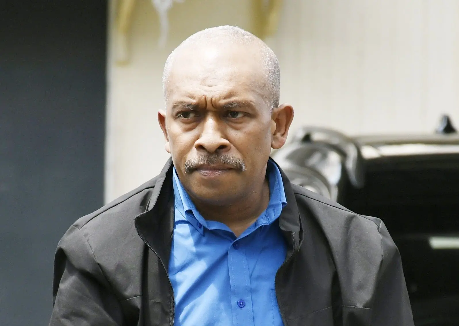 Senior police officer Varinava Sabua outside the Suva Magistrate Court.