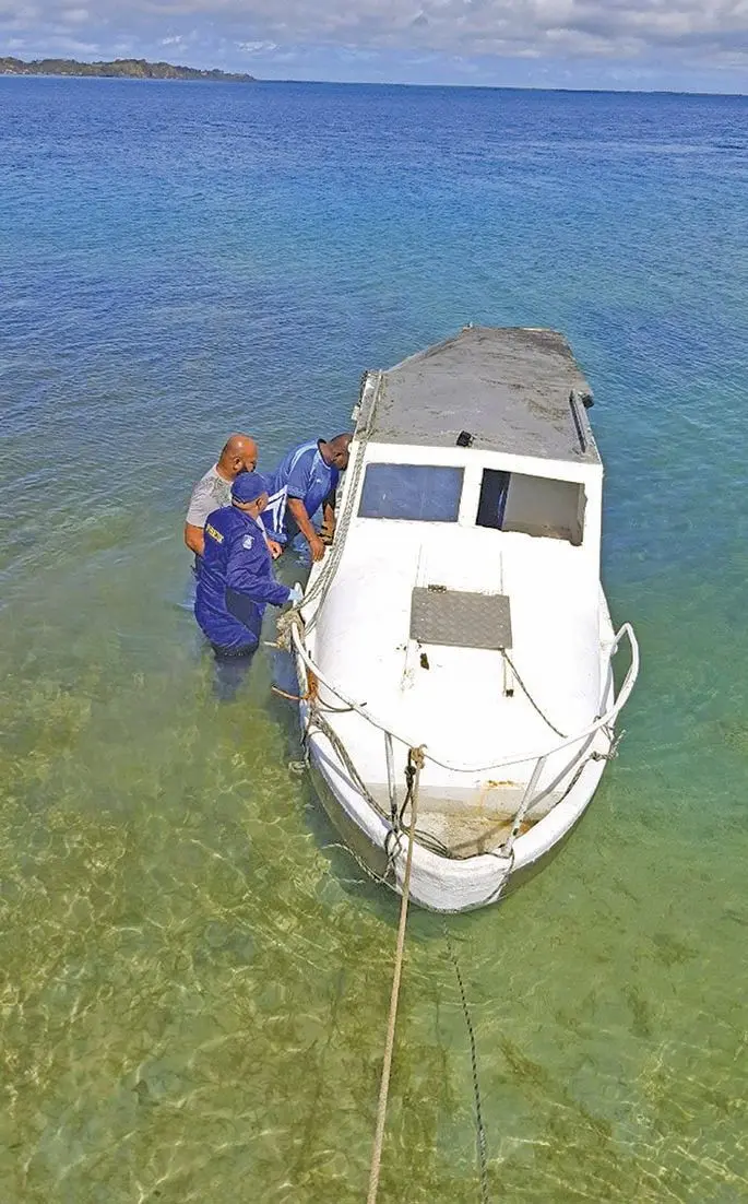 Police investigate the boat which capsized resulting in the death of Sergeant Raj Gopal Chetty. Photo: Police Media Cell