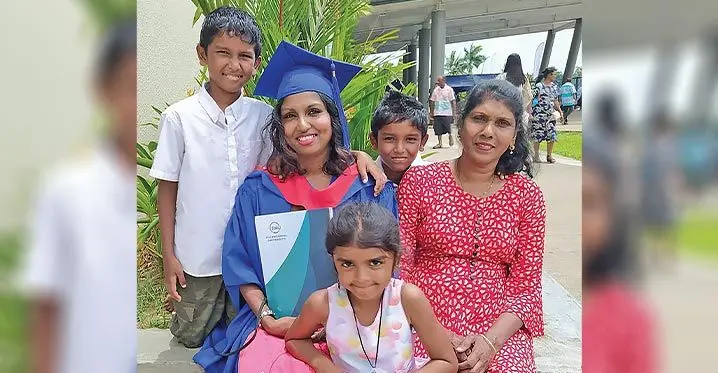 Kartika Salona Naidu with her children and mother during the Fiji National University graduation ceremony in December last year. Photo: Fiji National University