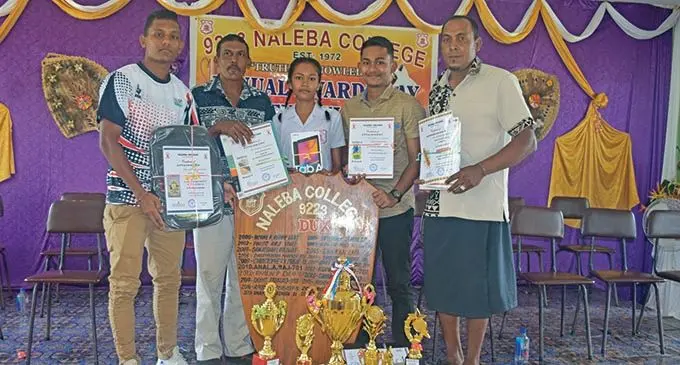 From left: Anish Kumar, Divendar Kumar, Naleba College Dux Kavita Kumar, Kavish Kumar and Teacher Ritesh Chand after the annual awards day on November 20, 2019. Photo: Laisai Lui.
