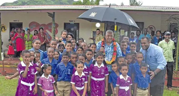 Prime Minister Voreqe Bainimarama commissions Namau Grid Extension Project at the Namau Public School Ba yesterday. Photo: WAISEA NASOKIA