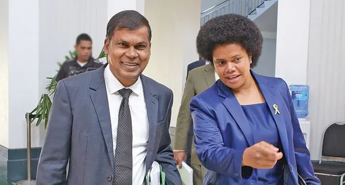 Opposition Member of Parliament Biman Prasad and Lenora Qereqeretabua outside Parliament on September 6, 2019. Photo: Ronald Kumar.