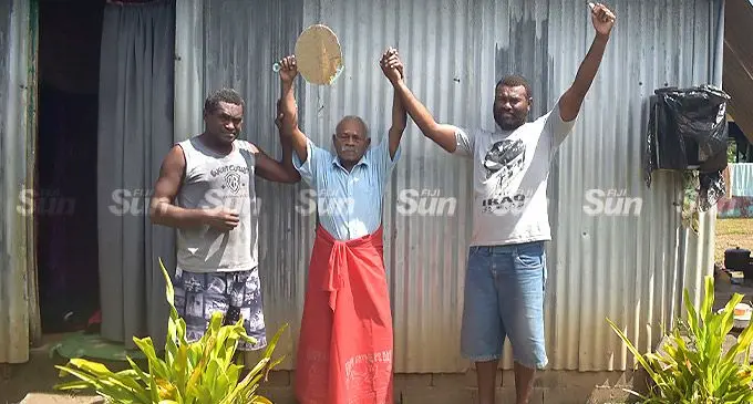 From left: Taniela Valailagi with his father, Tevita Raunacalevu, and cousin Daniva Amitai at their home in Semo Village, Sigatoka, on April 11, 2022. Photo: Mereleki Nai