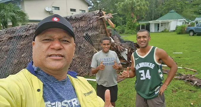 Fiji Community Vanuatu president Thomas Bruce with two other Fijians as they prepare for Tropical Cyclone Judy