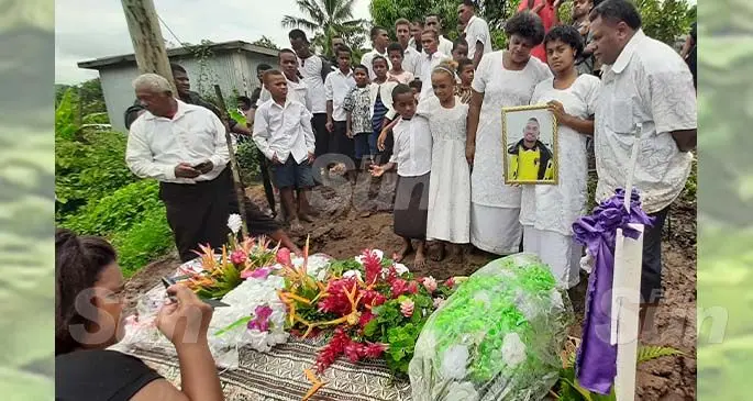 (Standing right) Ulaisi Nasilasila, Lanieta Nasilasila and Mere Nasilasila in front of the resting place of the late Mosese Nasilasila at their home in Tomuka, Lautoka, on March 13, 2020. Photo: Salote Qalubau