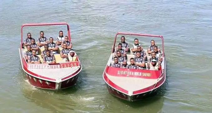 The Nadroga rugby team on board the boats of main sponsors Sigatoka River Safari Tours.