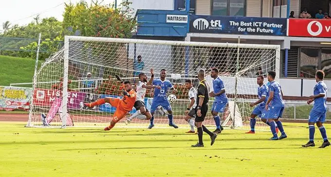 Lautoka goalkeeper Beniamino Mateinaqara makes a desperate save as Suva strikers Samuela Drudru and Anish Khem close in while defender Atonio Tuivuna looks on during the Digicel Premier League clash at the ANZ Stadium, Suva, on February 13, 2022. Photo: Waisea Nasokia