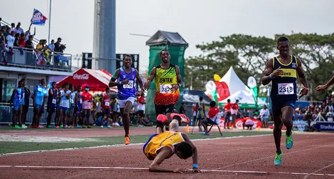 Suva Grammar School  athlete Elijah Tokikivunuku  wins the 400 metres boys  final after he dived across the line to claim the gold medal on Day Two of the  2022 Coke Games on  August 20, 2022 at the  HFC Bank Stadium in Suva. Since then, a photo of him diving went viral on social  media. Tokikivunuku has not been to school since Monday. Photo: Leon Lord