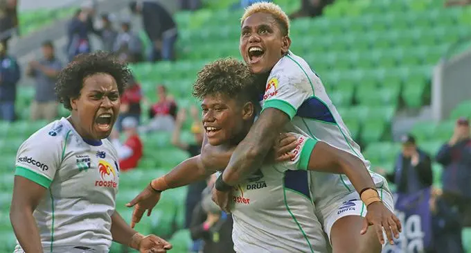 Rooster Chicken Fijiana Drua players (left-right) Karalaini Naisewa, Vitalina Naikore and Roela Radiniyavuni react at the sound of the final whistle against NSW Waratahs in the Super W grandfinal at AAMI Park in Melbourne, Australia, on April 23, 2022. Fijiana Drua won 32-26. Photo: FRU Media
