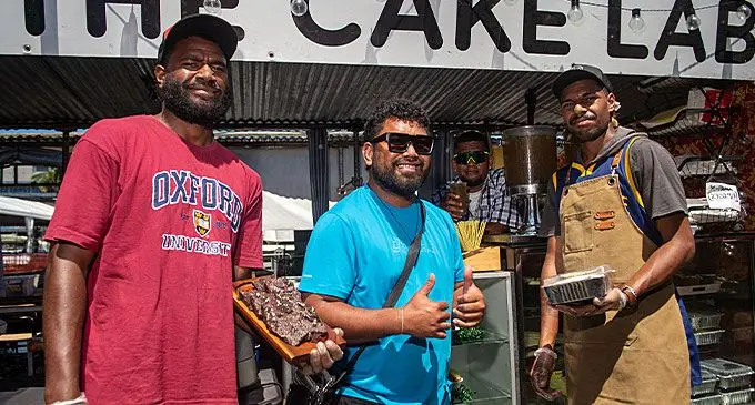 From left:, Josese Cagica, Kilimo Mainamena and Rupeni Sau in their food stall at the Suva foreshore on September 3, 2024. Photo: Leon Lord